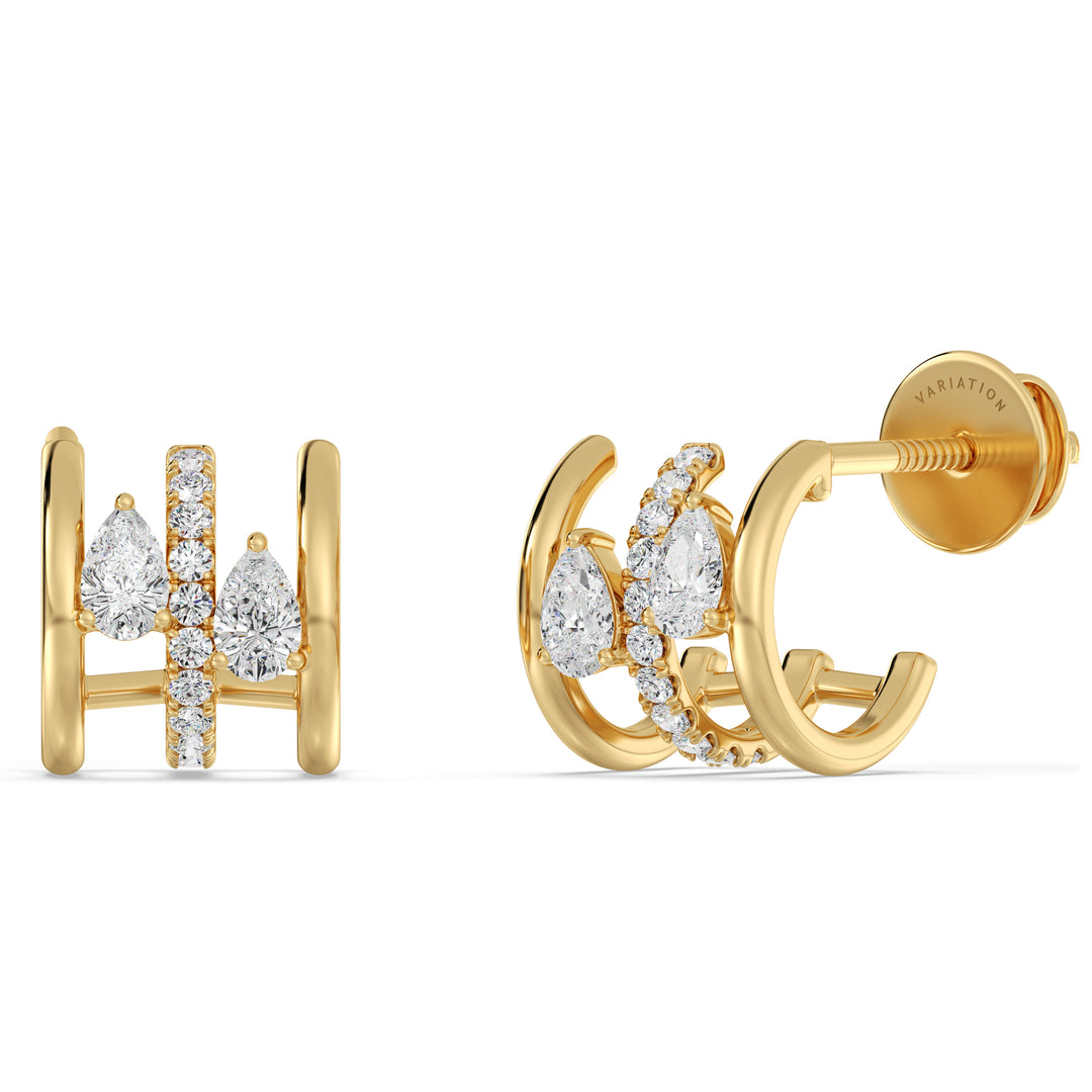 18K Yellow Gold Triple Hoop Huggee Earrings adorned with lab-grown diamonds, featuring a mix of round and pear-cut stones for a dazzling sparkle