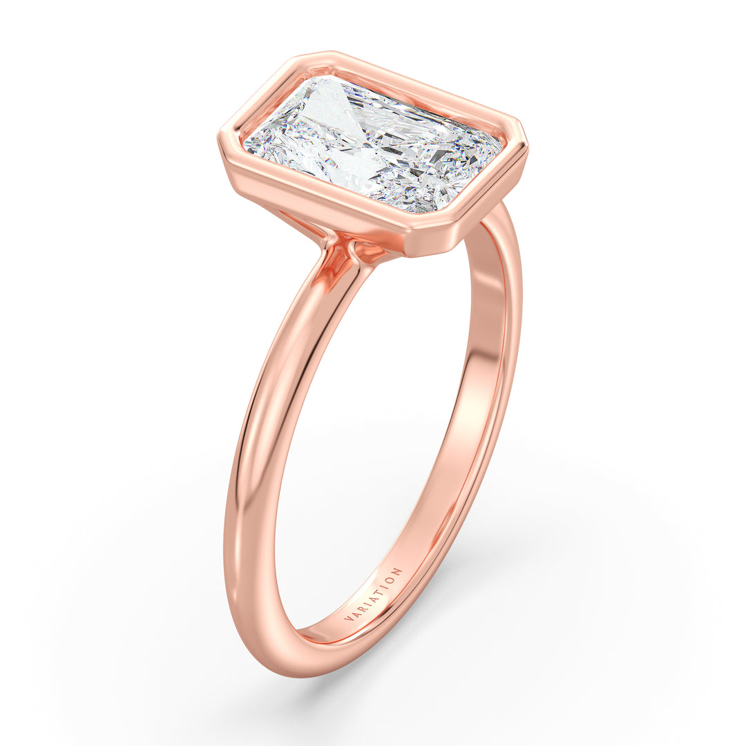 Radiant Cut Lab-Grown Diamond Solitaire Ring in 18K Rose Gold. Features a dazzling radiant cut diamond set in a sleek bezel setting, offering a romantic touch with its soft, pink-toned glow