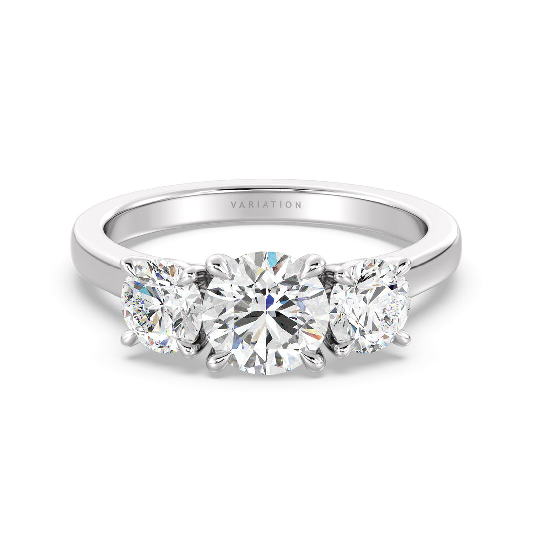 Three-Stone Round Cut Lab-Grown Diamond Engagement Ring in White Gold with Claw Setting, featuring a 1ct center diamond and two 0.50ct side diamonds, accented with pave diamonds