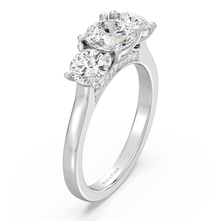 Three-Stone Round Cut Lab-Grown Diamond Engagement Ring in White Gold with Claw Setting, featuring a 1ct center diamond and two 0.50ct side diamonds, accented with pave diamonds