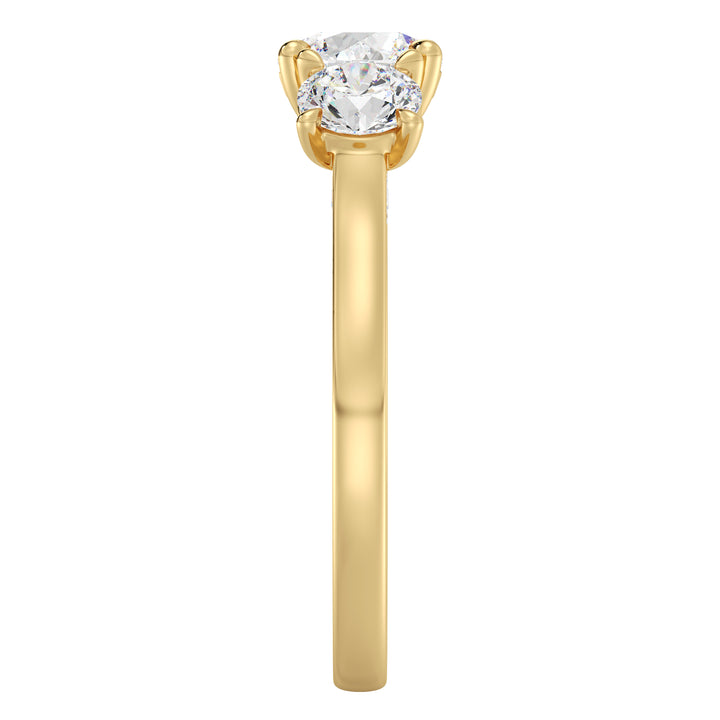 Three-Stone Round Cut Lab-Grown Diamond Engagement Ring in Yellow Gold with Claw Setting, featuring a 1ct center diamond and two 0.50ct side diamonds, accented with pave diamonds