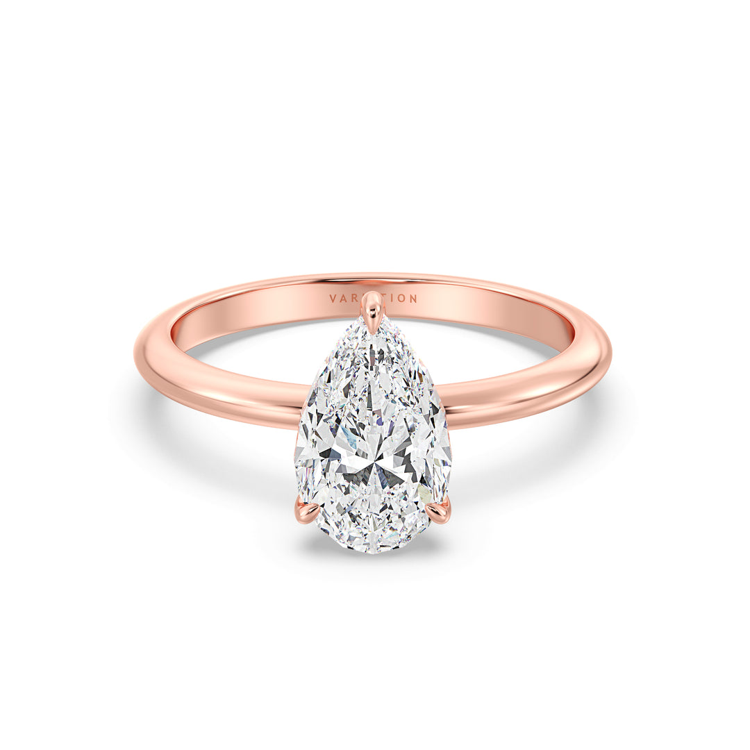 Timeless 3-Claw Pear Cut Lab-Grown Diamond Solitaire Engagement Ring in 18K Rose Gold, featuring a stunning pear-cut diamond in a classic claw prong setting