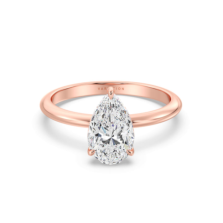 Timeless 3-Claw Pear Cut Lab-Grown Diamond Solitaire Engagement Ring in 18K Rose Gold, featuring a stunning pear-cut diamond in a classic claw prong setting