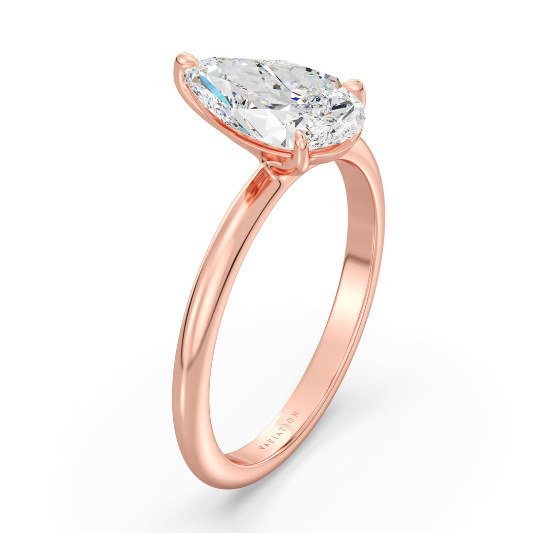 Timeless 3-Claw Pear Cut Lab-Grown Diamond Solitaire Engagement Ring in 18K Rose Gold, featuring a stunning pear-cut diamond in a classic claw prong setting