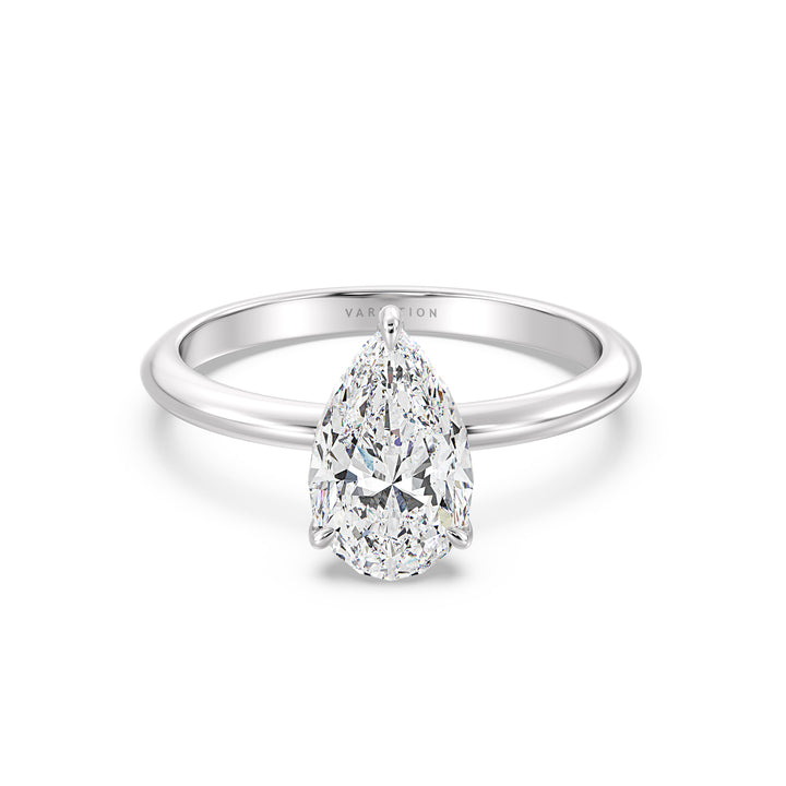 Timeless 3-Claw Pear Cut Lab-Grown Diamond Solitaire Engagement Ring in 18K White Gold, with a pear-shaped lab-grown diamond in a sleek claw prong setting