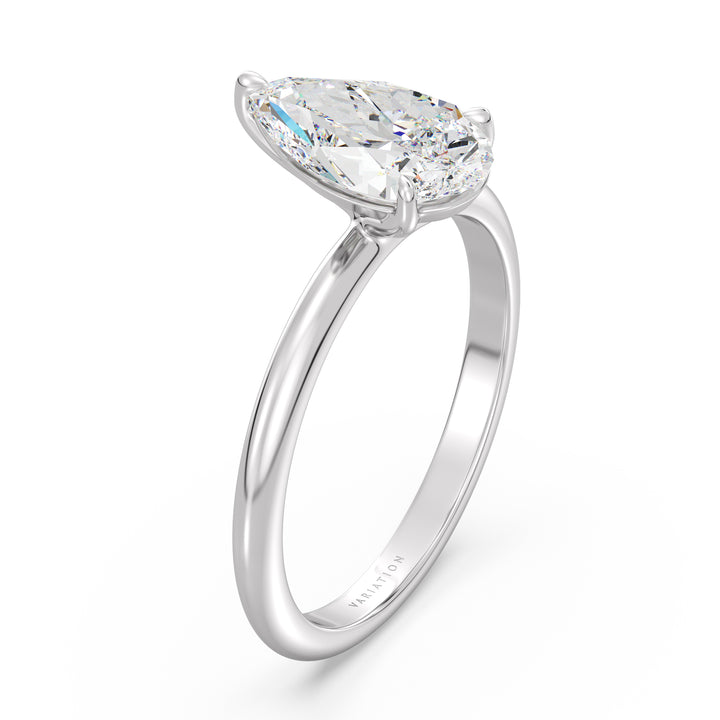 Timeless 3-Claw Pear Cut Lab-Grown Diamond Solitaire Engagement Ring in 18K White Gold, with a pear-shaped lab-grown diamond in a sleek claw prong setting