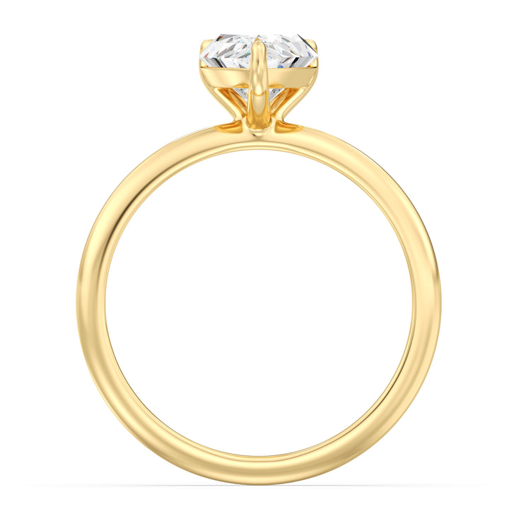 Timeless 3-Claw Pear Cut Lab-Grown Diamond Solitaire Engagement Ring in 18K Yellow Gold, showcasing a brilliant pear-cut diamond held securely in a three-claw prong setting