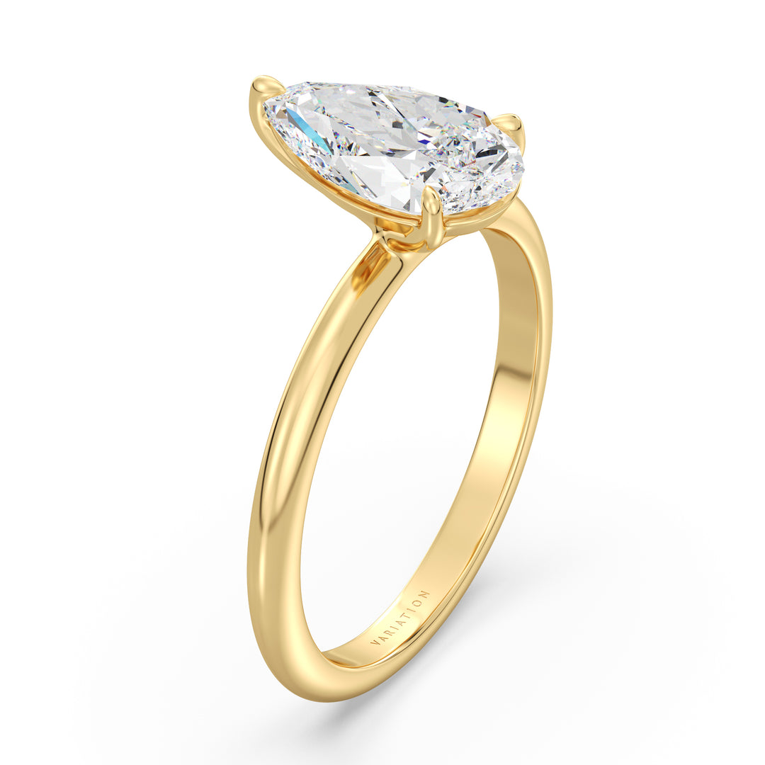 Timeless 3-Claw Pear Cut Lab-Grown Diamond Solitaire Engagement Ring in 18K Yellow Gold, showcasing a brilliant pear-cut diamond held securely in a three-claw prong setting