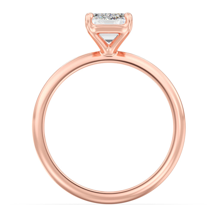 A chic Emerald Cut Lab-Grown Diamond Solitaire Engagement Ring in 18K Rose Gold, highlighting a beautiful emerald cut diamond in a classic 4-claw prong setting