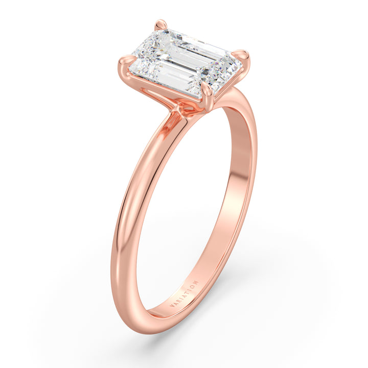 A chic Emerald Cut Lab-Grown Diamond Solitaire Engagement Ring in 18K Rose Gold, highlighting a beautiful emerald cut diamond in a classic 4-claw prong setting