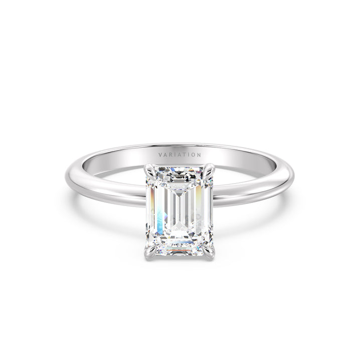 A sophisticated Emerald Cut Lab-Grown Diamond Solitaire Engagement Ring in 18K White Gold, showcasing a brilliant emerald cut diamond held in a classic 4-claw prong setting