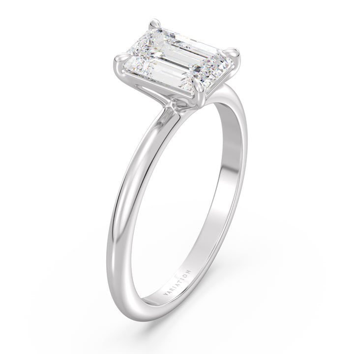 A sophisticated Emerald Cut Lab-Grown Diamond Solitaire Engagement Ring in 18K White Gold, showcasing a brilliant emerald cut diamond held in a classic 4-claw prong setting