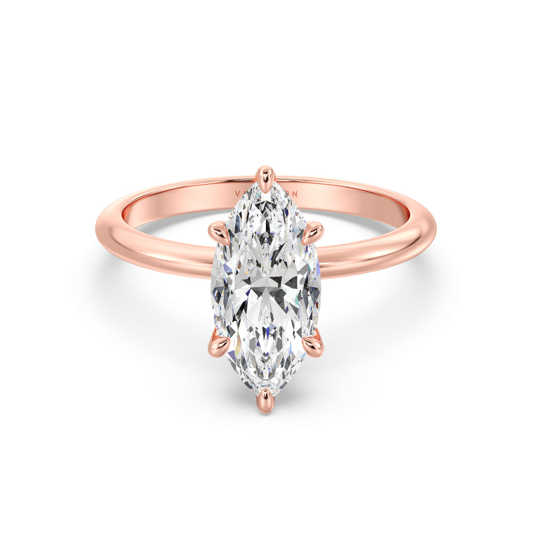 Timeless Marquise Cut Lab-Grown Diamond Solitaire Engagement Ring in 18K Rose Gold. The exquisite marquise-cut diamond is held in a 6-claw prong setting, available in carat weights from 1.00ct to 4.00ct