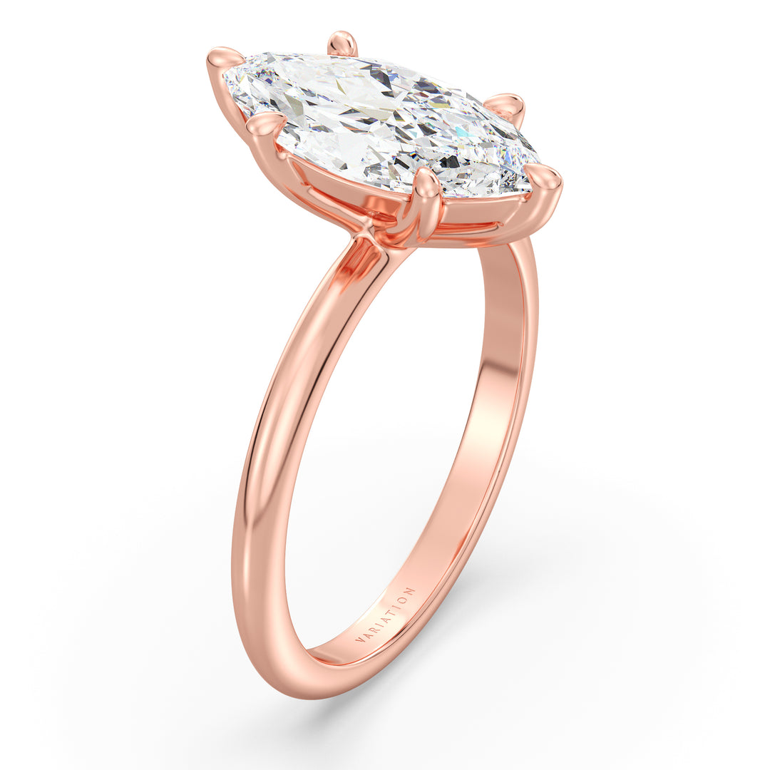 Timeless Marquise Cut Lab-Grown Diamond Solitaire Engagement Ring in 18K Rose Gold. The exquisite marquise-cut diamond is held in a 6-claw prong setting, available in carat weights from 1.00ct to 4.00ct