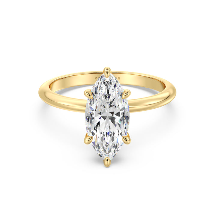 Timeless Marquise Cut Lab-Grown Diamond Solitaire Engagement Ring in 18K Yellow Gold. The stunning marquise-cut diamond is elegantly set in a 6-claw prong setting, available in carat weights from 1.00ct to 4.00ct