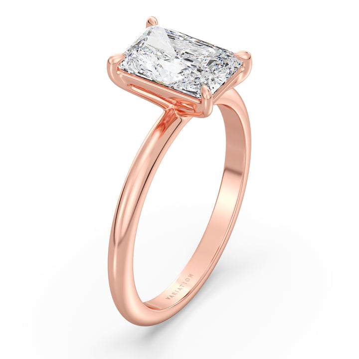 Engagement ring featuring a radiant-cut lab-grown diamond set in a classic 4-claw prong setting, crafted in 18K rose gold