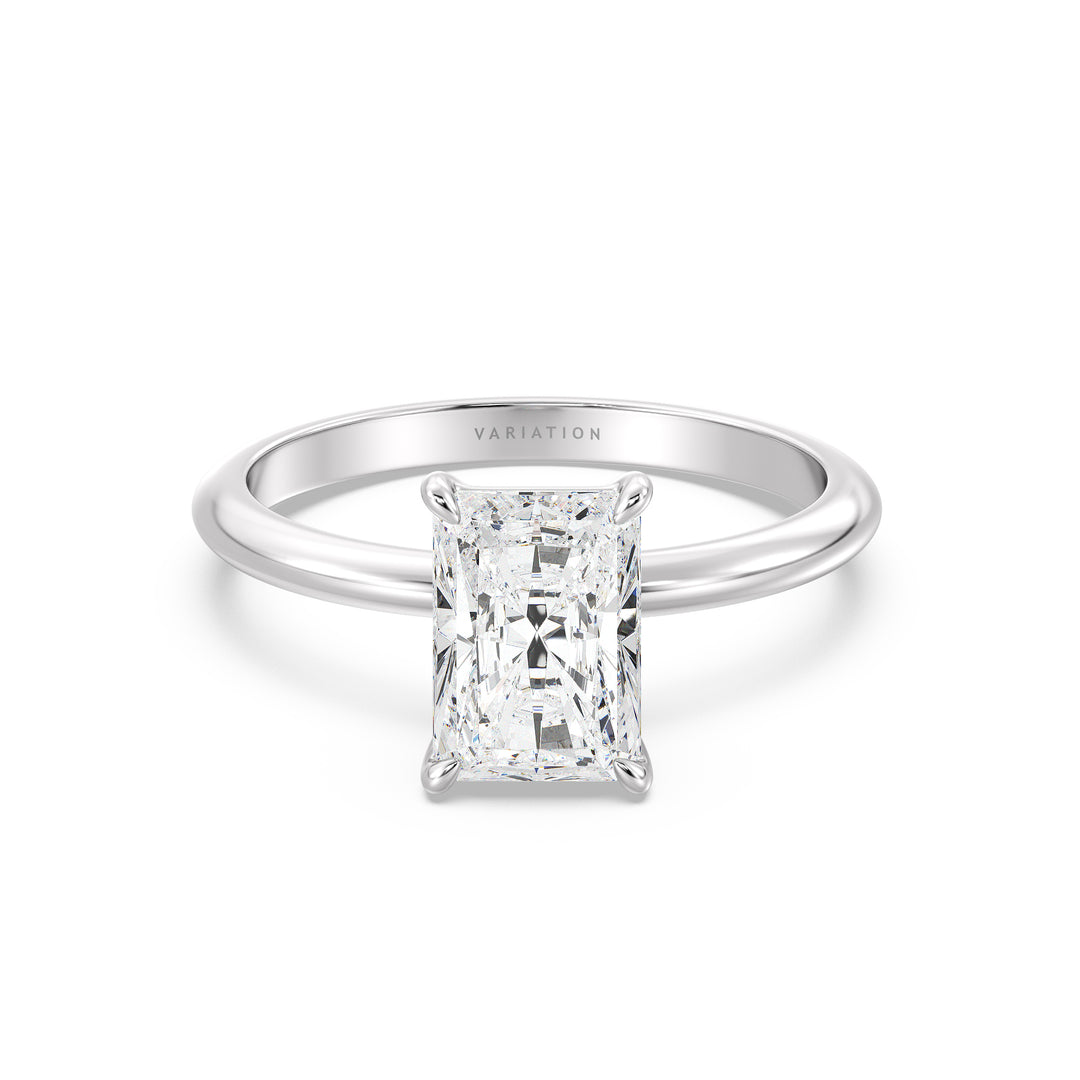 Engagement ring showcasing a radiant-cut lab-grown diamond in a classic 4-claw prong setting, made from 18K white gold