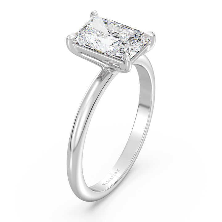 Engagement ring showcasing a radiant-cut lab-grown diamond in a classic 4-claw prong setting, made from 18K white gold