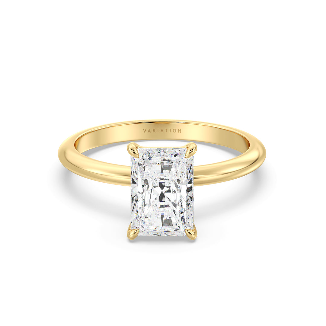 Engagement ring with a radiant-cut lab-grown diamond in a classic 4-claw prong setting, crafted in 18K yellow gold