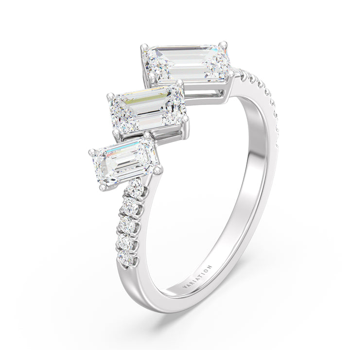 Triple Emerald-Cut Lab-Grown Diamond Wedding Band in 18K White Gold, adorned with three emerald-cut diamonds and pavé-set round-cut side stones, totaling 1.94 carats