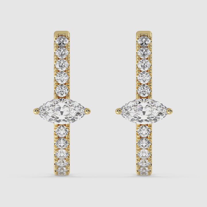 360-degree video showcasing Elegant 18KT Yellow Gold Twist Hoop Earrings adorned with Lab-Grown Diamonds, featuring a sparkling combination of Round and Marquise Cut diamonds totaling 0.73ct