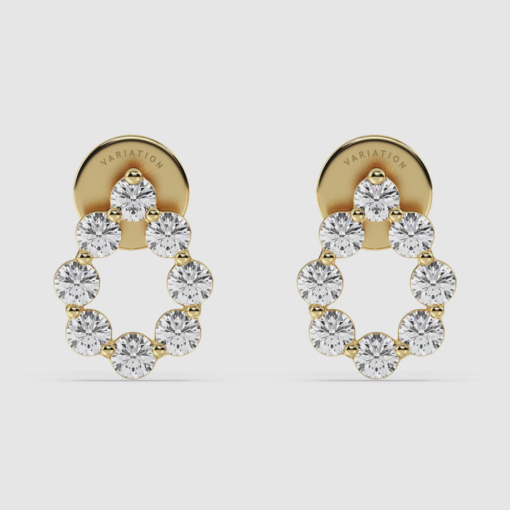 Video showcasing 18KT Yellow Gold Pear-Shaped Stud Earrings with Round Lab-Grown Diamonds. Features 16 sparkling round diamonds totaling 0.48 carats with EF color and VS clarity, set in a stylish pear shape for a luxurious and elegant look