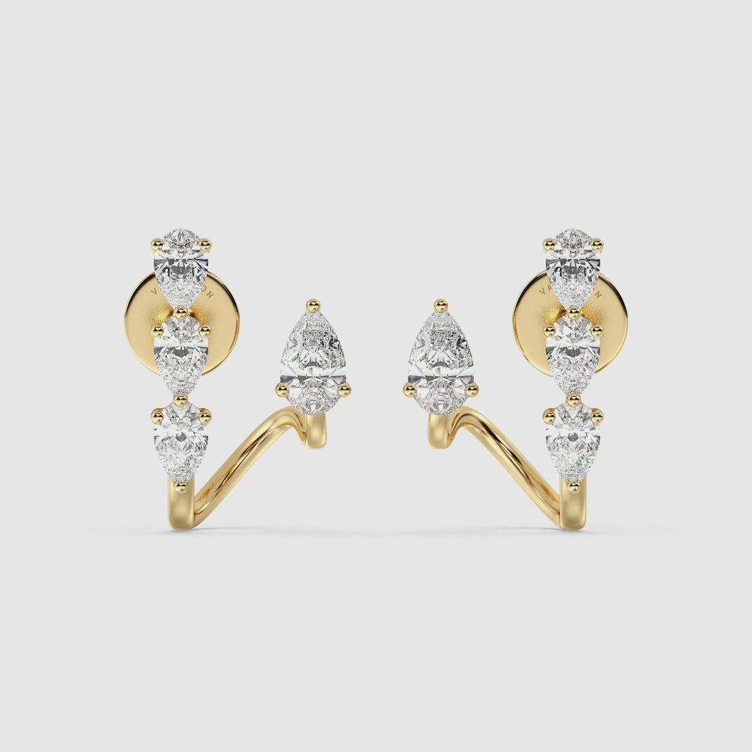 Video showcasing Pear Lab-Grown Diamond Stud Earrings in 18KT Yellow Gold, featuring 8 dazzling pear-cut diamonds with exceptional brilliance, highlighting their sparkle and elegant design from multiple angles