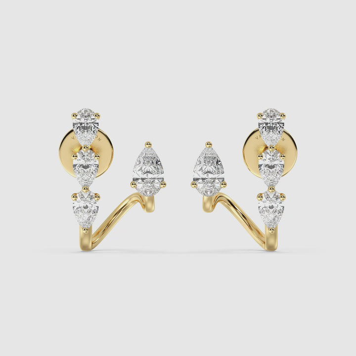 Video showcasing Pear Lab-Grown Diamond Stud Earrings in 18KT Yellow Gold, featuring 8 dazzling pear-cut diamonds with exceptional brilliance, highlighting their sparkle and elegant design from multiple angles